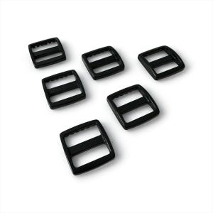 May include: Six black plastic tri-glide slides, each with a rectangular frame and two horizontal bars. The slides are evenly spaced against a white background. These are commonly used for adjusting straps on bags, backpacks, and other accessories.