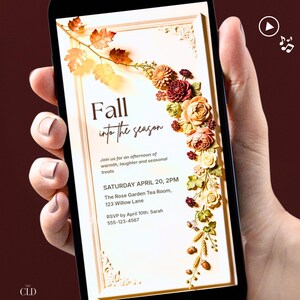 Peut inclure: Une invitation numérique affichée sur un écran de smartphone avec le texte Fall into the season, Join us for an afternoon of warmth, laughter and seasonal treats, Saturday April 20, 2PM, The Rose Garden Tea Room, 123 Willow Lane, RSVP by April 10th: Sarah 555-123-4567, ornée d'une bordure de feuilles d'automne, de fleurs et de glands en relief.