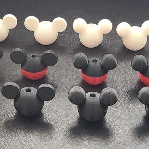 Mickey Mouse-geïnspireerde set van 2 trekhendels voor lampen/jaloezieën, verkrijgbaar in verschillende kleuren.