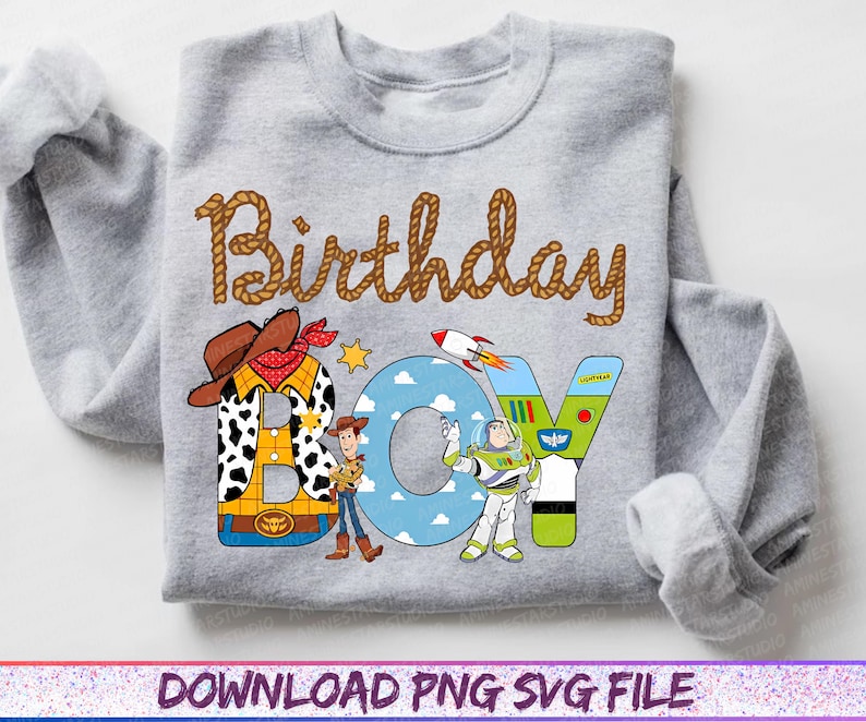 May include: A light gray sweatshirt featuring the word "Birthday" in brown rope-style lettering. The word "BOY" is designed with cartoon characters and imagery from the movie Toy Story. The sweatshirt has long sleeves.