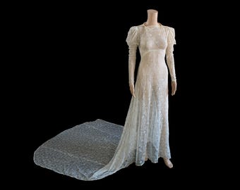 Jaren 30 trouwjurk / jaren '30 getrainde jurk / Juliet gepofte lange mouwen / spitse polsen / prinsessennaden / vampkraag / zeldzame decoratieve kantmotieven