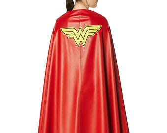 May include: A red cape with a yellow and black emblem on the back. The cape is made of a shiny material and drapes down to the knees. The emblem is a stylized "W" with wings.