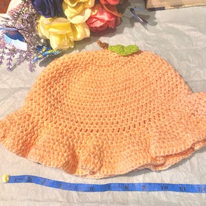 Peach cute bucket hat standard adult size with stem and leaf