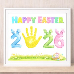 May include: A framed watercolor print with the words "HAPPY EASTER" in colorful letters. The numbers 2, a yellow handprint, 2, and 6 are decorated with bunny ears. A basket of eggs and a chick are in the bottom right.