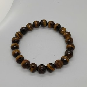 Pulsera de ojo de tigre con certificación de laboratorio / Cuentas de cristal marrón natural para fuerza y concentración / Joyería de protección Reiki hecha a mano unisex