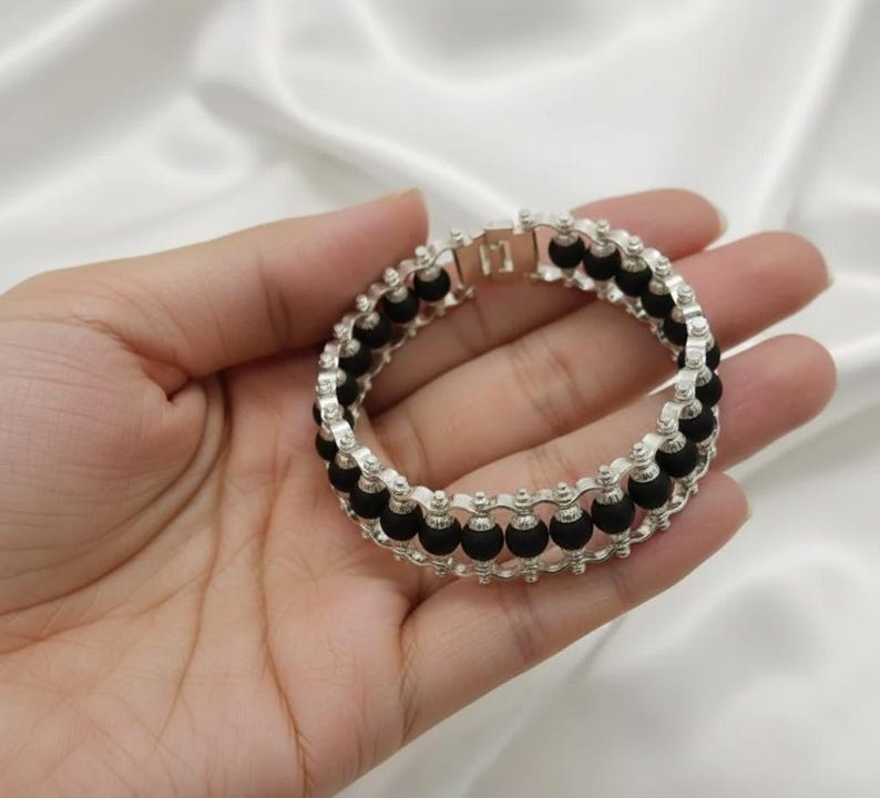 Handcrafted natural black Karungali wood bracelet offering a classic look with spiritual and protective significance.