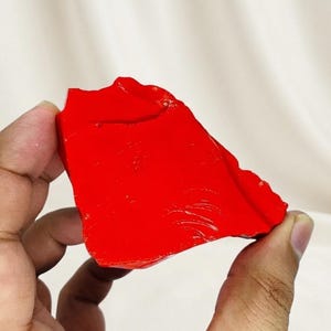 Raw red coral specimen weighing approximately 1350 carats total for jewelry crafting and experienced lapidary artists.