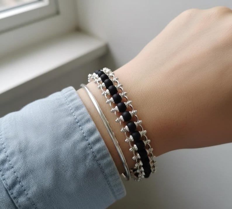 Authentic Karungali black wood protective bracelet with polished oversized beads for men and women.