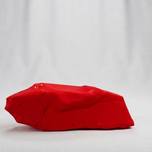 Raw Mediterranean red coral material for lapidary artists, collectors, Reiki-inspired displays and meditation spaces.