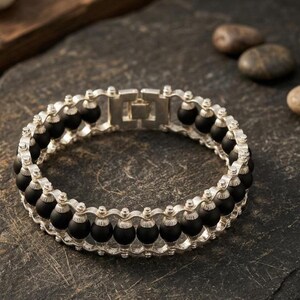 Natural Karungali wood bracelet featuring large black beads, designed for spiritual healing, meditation, and everyday style.
