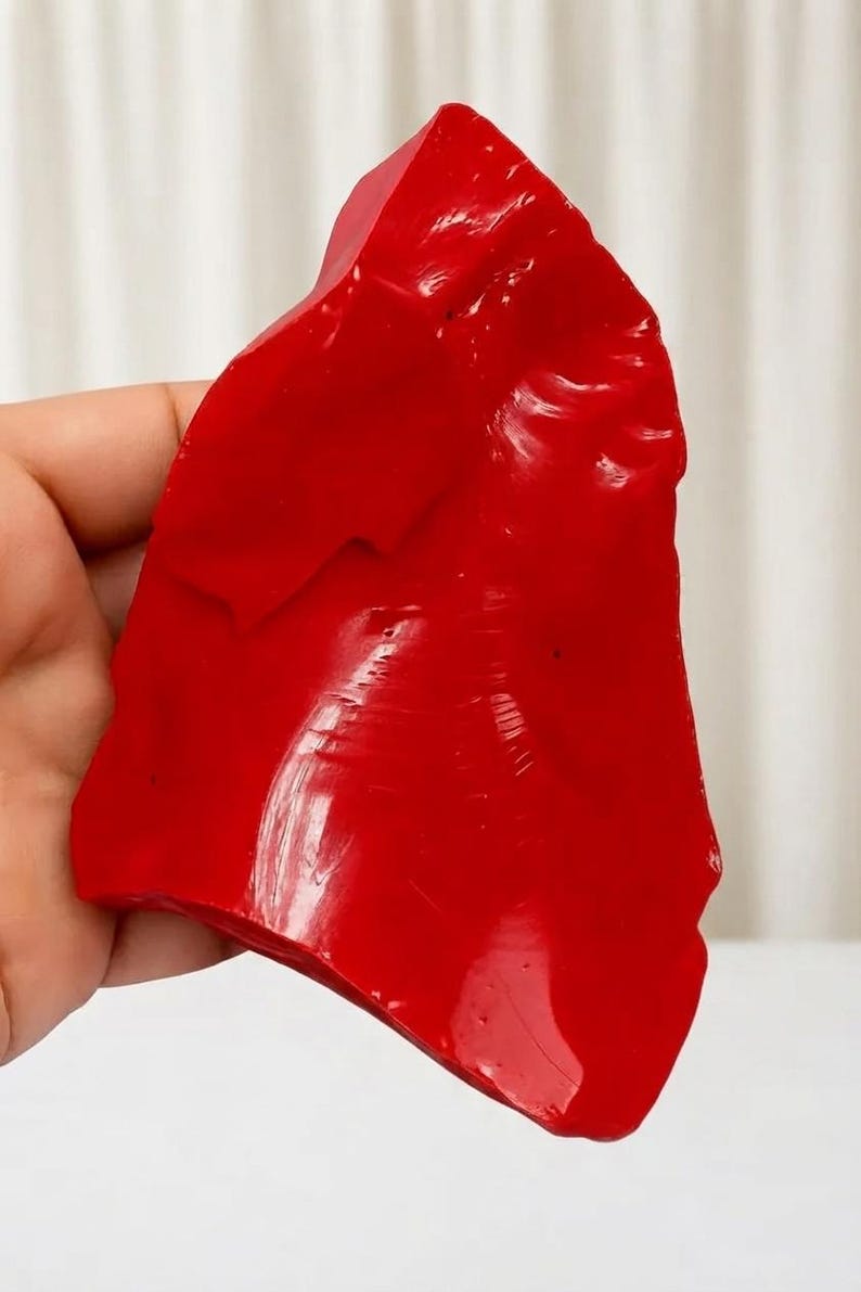 Large Italian red coral rough specimen with vivid red appearance, approximately 1350ct total for lapidary and jewelry making.