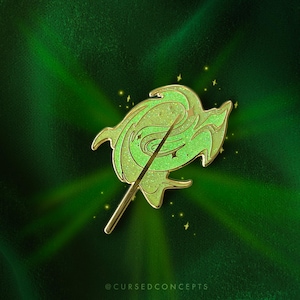 May include: A green enamel pin with a swirling design and a gold-colored wand. The pin has glitter accents and is set against a dark green background with light streaks. The text "@CURSEDCONCEPTS" is at the bottom.