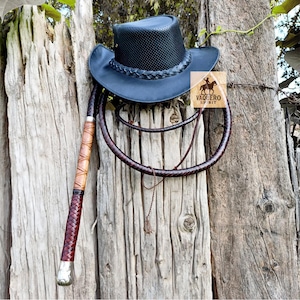 Close-up of braided leather plaits on custom bullwhip