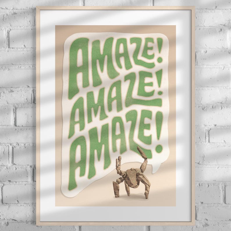 Puede incluir: Una l&aacute;mina enmarcada con el texto "AMAZE! AMAZE! AMAZE!" en letras verdes onduladas dentro de una burbuja de di&aacute;logo blanca, sobre un fondo beige claro, con una peque&ntilde;a ilustraci&oacute;n de un cangrejo marr&oacute;n debajo del texto.