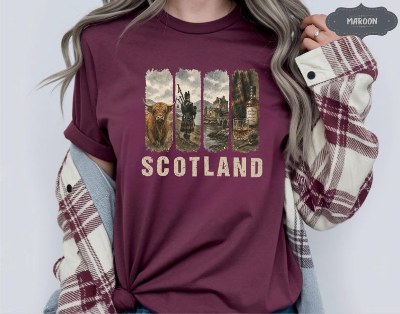 May include: Maroon t-shirt featuring a vintage-style design with four vertical panels. The panels depict a Highland cow, a bagpiper, a castle, and a whiskey bottle with a glass. The word "SCOTLAND" is printed in a distressed font.