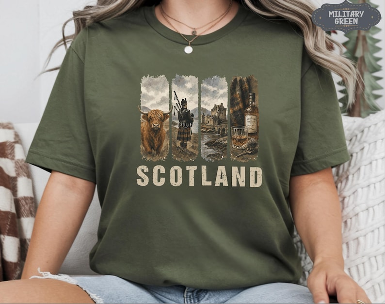May include: Military green t-shirt featuring a graphic design with four vertical panels. The panels depict a Highland cow, a bagpiper, a castle, and a bottle of whiskey. The word "SCOTLAND" is printed in a distressed font.