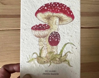 Tarjeta de felicitación con semillas de amanita muscaria (flor silvestre plantable)