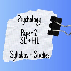 May include: A piece of crumpled graph paper held by a black binder clip against a blue gradient background. The paper has the words "Psychology Paper 2 SL + HL Syllabus + Studies" written on it in black cursive font.