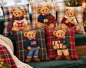 May include: A set of five square throw pillows featuring plush teddy bears in various holiday outfits. The bears are depicted on plaid backgrounds, holding items like a mug, a wreath, a star, an American flag sweater, and gift boxes.