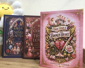 Once Upon a Broken Heart hardcover / paperback , The Ballad of Never After, or A Curse for True Love  – A5 Water-new cover Art