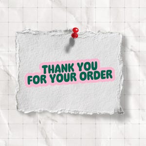 May include: A torn piece of white paper with the text "THANK YOU FOR YOUR ORDER" in green letters with a pink outline. A red push pin secures the paper to a textured, off-white surface with a grid pattern.