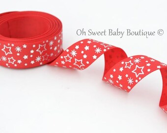 May include: Red ribbon with a white star and snowflake pattern.  Oh Sweet Baby Boutique ©