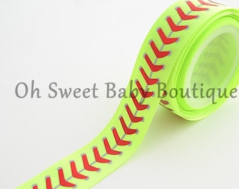 May include: A roll of lime green ribbon with a red baseball stitch design.