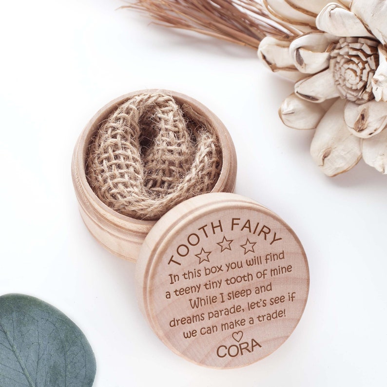 The small wooden pill box engraved with the tooth fairy poem make a sweet alternative tooth fairy pouch gift for kids.