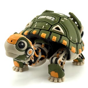 May include: A 3D-printed turtle figurine with a mechanical design. The turtle features a green shell with orange accents, a tan head, and robotic-style legs. The figurine has a detailed, textured appearance.