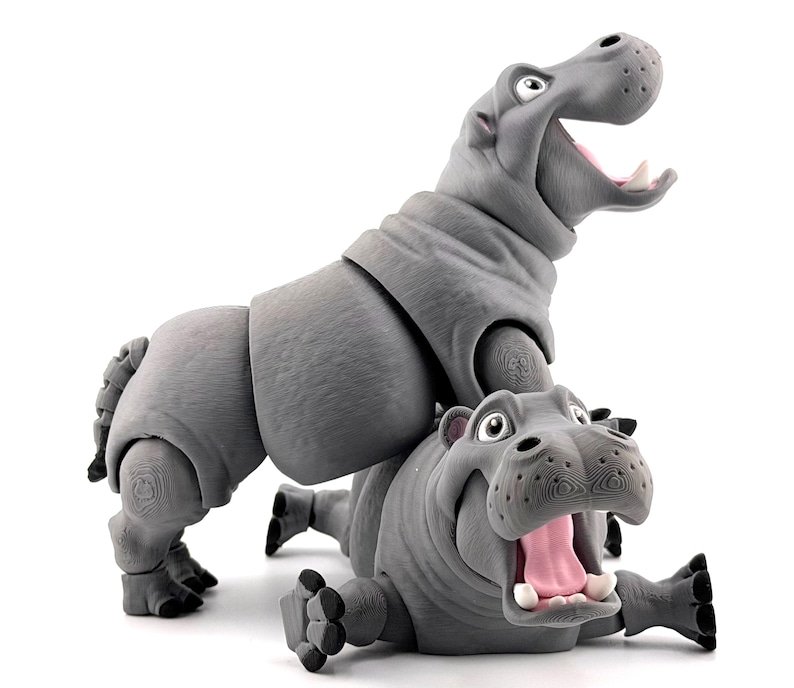 K&ouml;nnte beinhalten: Ein Set aus drei Keramikbechern mit gesprenkelter, matter Oberfl&auml;che. Die Becher sind in Creme-, Hellgrau- und Dunkelgraut&ouml;nen gehalten. Jeder Becher hat ein schlichtes, minimalistisches Design.