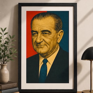 May include: A framed portrait print featuring a stylized illustration of Lyndon B. Johnson. The subject is depicted in a suit and tie against a split background of solid red and dark blue. The artwork is encased in a simple black rectangular frame.