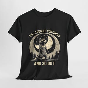 Funny Raccoon T-Shirt: The Struggle Continues Graphic Tee