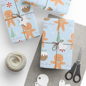 Cute blue gingerbread boy gift wrap with custom name styled for boys Christmas present wrapping