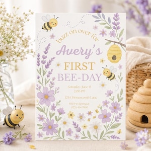 May include: A rectangular invitation card featuring a bee-themed design with lavender flowers, daisies, and two cartoon bees. The text reads: buzz on over for Avery's FIRST BEE-DAY, Saturday, June 15, 2:00 PM, 1234 Honeycomb Lane, RSVP to Janna at (123) 456-7890.