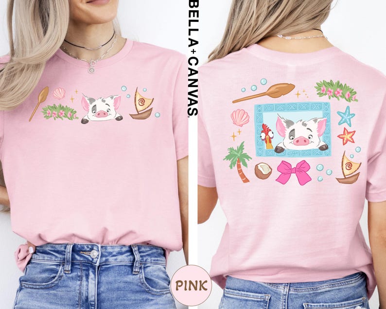 a woman wearing a pink t-shirt with a cartoon pig design and various other colorful illustrations.