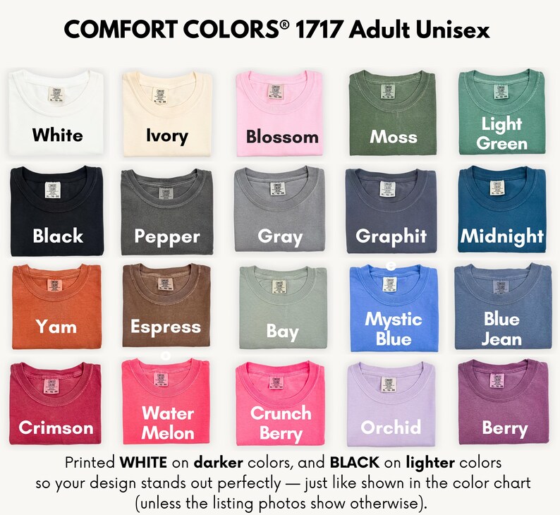 a collection of 1717 adult unisex t-shirts in various colors, including white, ivory, pink, green, black, pepper, gray, graphite, midnight, yam, yam, express, bay, mystical blue, blue jeans, and orchid. The t-shirts are neatly folded and arranged in a grid pattern.