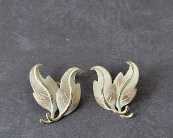 Monet White Leaf Earrings Clip On Gold Tone