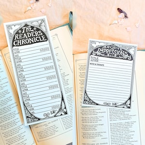 May include: Two vintage-style bookmarks with black and white designs. One reads "The Readers Chronicle" with fields for title, author, and date. The other says "Archive Impressions" with space for notes. Both are on open books.