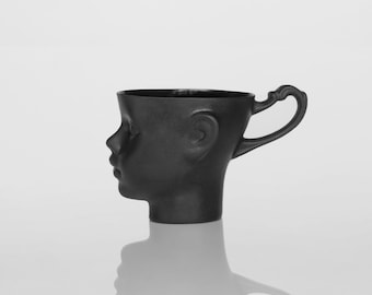 Porcelain doll head mug in black - whimsical black ceramic artisan cup, for coffee or tea