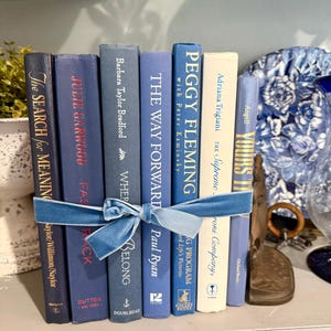 Vintage ombré effect blue Decorative Book collection, cook collection and cast iron sailboat bookend