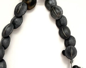 Handmade polymer clay necklace: convertible bead necklace in shades of blacks and charcoal grays.