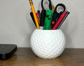 Organizador de escritorio con forma de pelota de golf