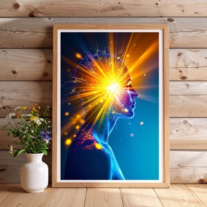 May include: A framed digital art print featuring a profile of a person with a radiant burst of light emanating from their head. The artwork uses a palette of blues, oranges, and yellows, creating a striking visual representation of the mind and consciousness.