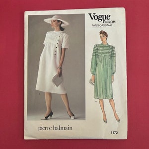May include: Vogue Patterns Paris Original sewing pattern for a dress by Pierre Balmain. The pattern number is 1172.