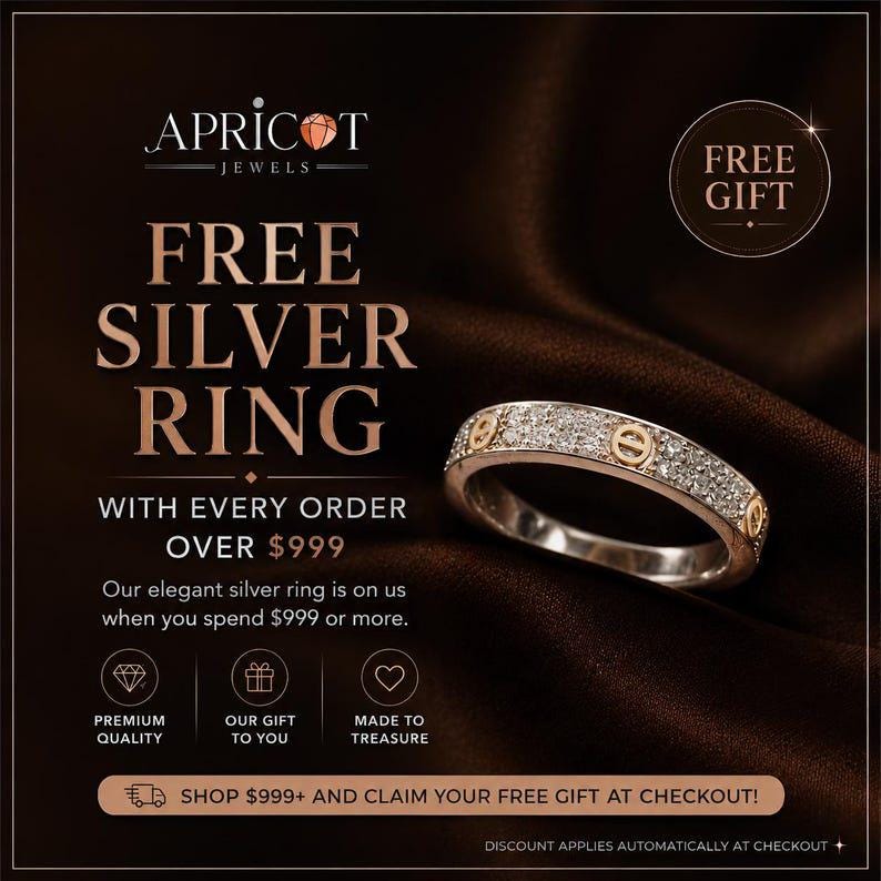 Pu&ograve; includere: Un anello color argento con una fascia incastonata di piccole pietre chiare e dettagli circolari color oro. Il testo sull'immagine recita APRICOT JEWELS, FREE SILVER RING, WITH EVERY ORDER OVER $999, PREMIUM QUALITY, OUR GIFT TO YOU, MADE TO TREASURE.