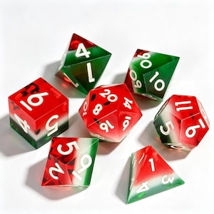 May include: A set of seven polyhedral dice featuring a watermelon-inspired design with translucent red and green resin, white gradient accents, and bold white numbers. The collection includes various geometric shapes such as cubes, pyramids, and icosahedrons.