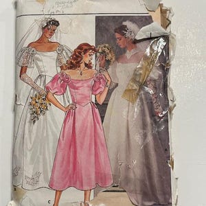 May include: Vintage Butterick sewing pattern featuring illustrations of three wedding dresses. The pattern cover is torn and shows a pink bridesmaid dress and two white bridal gowns. The pattern number is 3136, size 8.