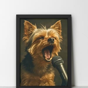 May include: Framed print featuring a Yorkshire Terrier with its mouth wide open, as if singing into a microphone. The dog has brown and black fur. The microphone is black. The frame is black and the background is a dark green.