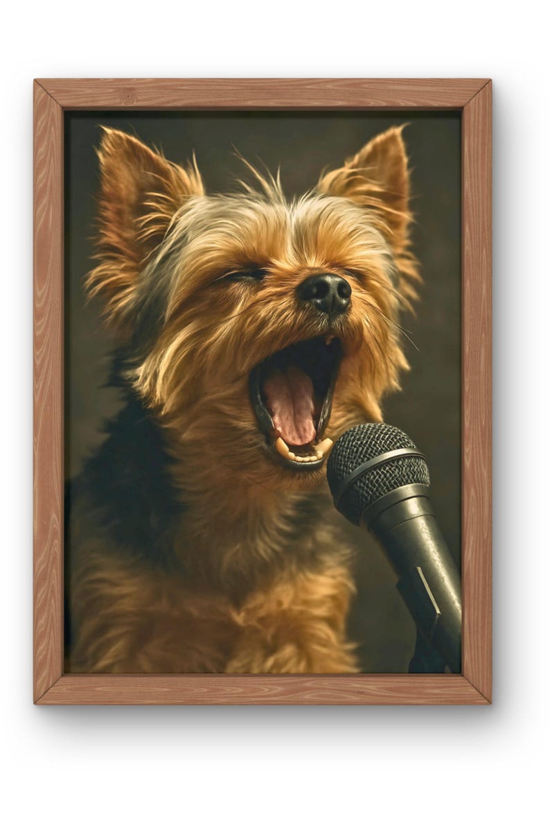 May include: A framed print featuring a Yorkshire Terrier with its mouth open, as if singing into a microphone. The dog has brown and black fur and is positioned in front of a dark background. The frame is made of wood.