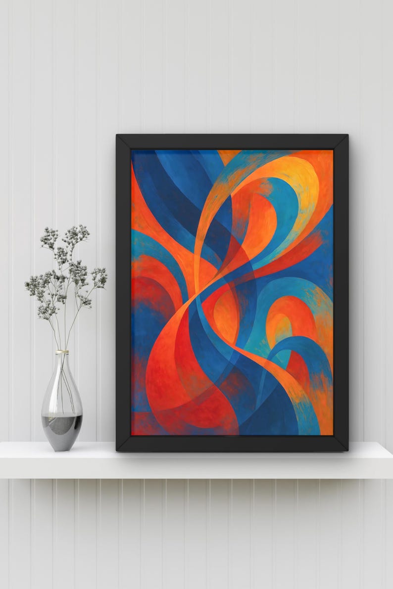 May include: Abstract art print in a black frame. The artwork features flowing, curved shapes in shades of blue, orange, and red. The painting is displayed on a white shelf with a clear glass vase containing dried flowers.